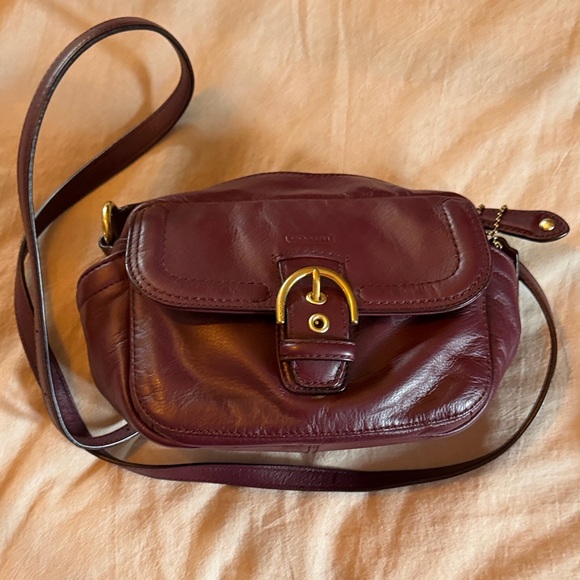 Coach Handbags - Coach Burgundy Leather Crossbody Bag with Gold Buckle